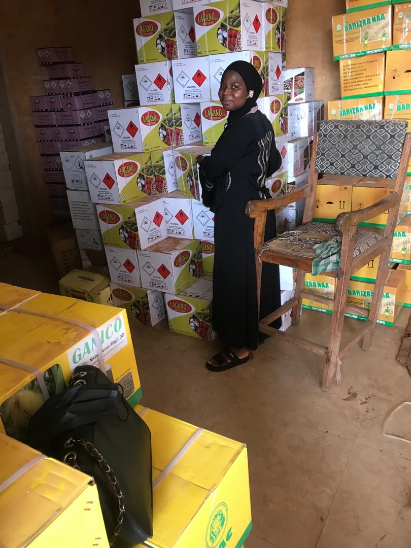 Warehouse stacked with boxed agro-chemical products